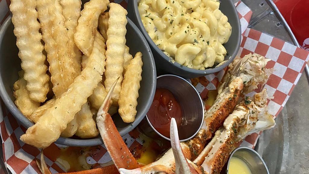 Snow Crab Legs (2 Claws) · Snow crab legs with your choice of sauce or drawn butter with two (2) sides.