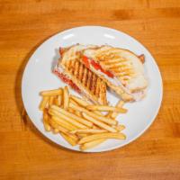 Turkey & Pepper Jack Panini · Smoked turkey breast, applewood bacon, roasted peppers, pepper jack cheese, and chipotle mayo.