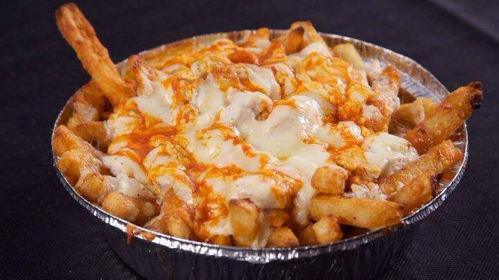 Pizza Fries · Fries with pizza sauce, topped with Mozzarella cheese.