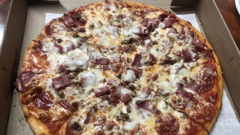 Meat Pie · Pepperoni, sausage, ham, ground beef, bacon, and Mozzarella cheese.