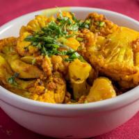 Aloo, Gobhi Tarkari · Local potato, cauliflower curry, fresh organic cauliflower and potatoes sautéed in spices wi...