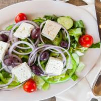 Greek Salad · Mixed lettuce, tomato, onion, green pepper and cucumber topped with imported kalamata olives...