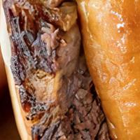 Ribeye Sandwich · Seven ounces of USDA Choice steak, grilled to your liking on a toasted bun. Try it Black & B...