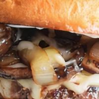 Mushroom Swiss Burger · Sauteed mushroom & Swiss cheese atop our 1/2-lb burger. Served with your choice of one side....