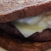 Patty Melt · A traditional from the griddle. Our 1/2-lb burger with carmalized onions & Swiss cheese on r...