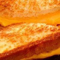 Kid'S Grilled Cheese · Toasted bread with melted American cheese.