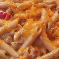 Cajun Shrimp & Chicken Pasta · Tender chicken & shrimp sauteed with red bell peppers & tossed with penne in a spicy Cajun A...
