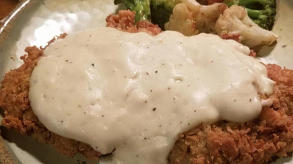 Chicken Fried Steak · Hand breaded and smothered with white gravy. Served with two sides. We proudly serve 100% USDA Choice beef lightly seasoned & grilled to your liking. Add grilled or fried shrimp .95 each • Add onions & mushrooms 1.99 • Blackened 1.00