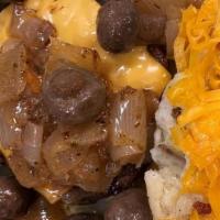 Smothered Hamburger Steak · Top-quality hand-formed ground chuck. Served with Cheese and Smothered with onions & mushroo...