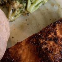 Blackened Salmon · We blacken an 8-oz salmon filet with Cajun seasoning. Served with your choice of two sides.