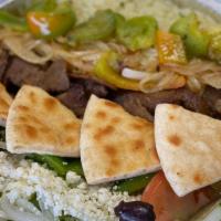 Gyro Bowl Special · Gyro or chicken bowl over rice with Greek salad