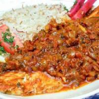 Curry Fish · Grilled white fish seasoned in lemon, olive oil, and spices, topped with thick curry sauce.