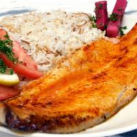 Broiled White Fish · Grilled fish filet seasoned with lemon, olive oil and spices.