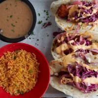 Baja Fish Taco · Crispy fried white fish, red cabbage, pickled red onions and chipotle mayo. 3 tacos served i...