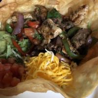 Fajita Salad · Mixed greens, re-fried beans, cheese, sauteed red and green bell peppers, tomatoes, onions a...