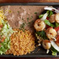 Shrimp Fajita · Succulent shrimp specially seasoned. Grilled and served sizzling with red and green bell pep...