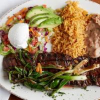 Carne Asada · Hand-cut and 21 day aged skirt steak marinated for flavor and tenderness, grilled and topped...