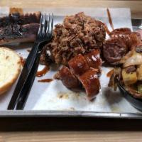 Bbq Tour · Lil Man Chopped Brisket or Pulled Pork  sandwich AND Two baby back ribs AND a Choice of: 1 C...