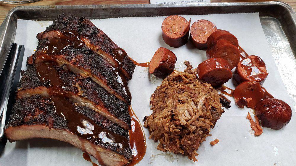 Rib Tour · Four Babyback Ribs and Side portion of Brisket OR Pulled pork AND 1-Chicken Drumstick OR choice of 1-Sausage.