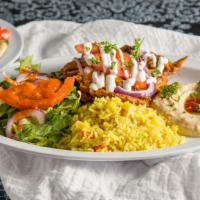 Shawarma Platter · Not a sandwich. Marinated chicken, beef or lamb grilled to perfection and topped with sautee...