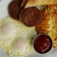 Ranch Breakfast · Your choice of country sausage patties, smoked bacon, or a thick slice of ham, two egg any s...