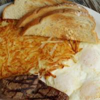 Steak And Eggs · 8 OZ Sirloin served with two eggs, hash browns, toast, and jelly.