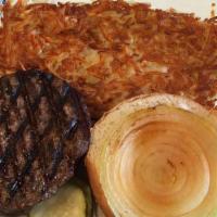 1/2 Lb. Flameburger · A half pound Flameburger with slice of grilled onion.