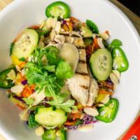Ginger Chicken (Most Popular Noodle Bowl) · Rice noodles with lime-cilantro-jalapeno-mint dressing with pickled carrots, cucumbers, cila...