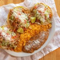 Tacos Tradicional · Lettuce, tomato and Chihuahua cheese.