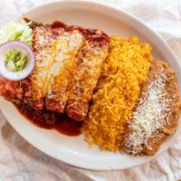 Enchiladas · Verde sauce, mole poblano or red sauce, choice of meat, melted Chihuahua cheese, served with...