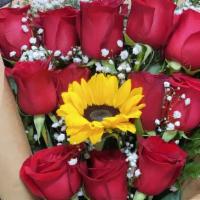 1 Dozen Long Roses  Bouquet With 1 Sunflower · This bouquet includes long stem roses with 1 sunflower.