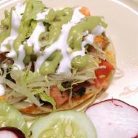Grilled Fish Taco · Grill fish with shredded lettuce, pico de gallo, drizzle with avocado salsa on soft grill fl...