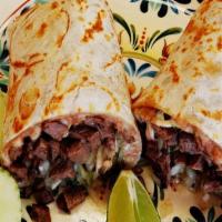 El Favorito · Everybody's favorite! Choice of your favorite meat with melted cheese, refried beans, onions...