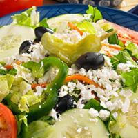 Greek Salad · Romaine lettuce, feta cheese, tomatoes, cucumbers, green peppers, pepperoncine, Kalamata oli...
