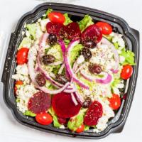 Side Greek Salad · Romaine lettuce, cucumbers, green peppers, tomatoes, pepperoncini, kalamata olives and Dino'...