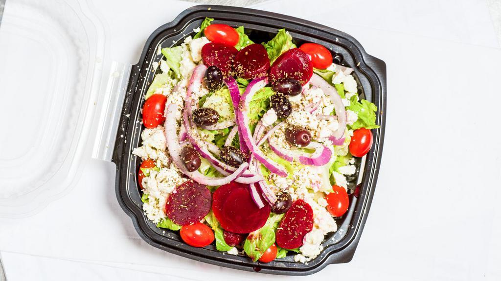 Side Greek Salad · Romaine lettuce, cucumbers, green peppers, tomatoes, pepperoncini, kalamata olives and Dino's Greek Dressing