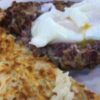 Corned Beef Hash And Eggs · Corned beef mixed with sweet onions, green peppers, baby potatoes grilled to order served wi...