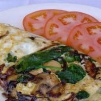 Egg White Burnt Onion Omelet · Gluten-free. Three egg whites filled with burnt sweet onions, baby spinach, mushrooms and lo...