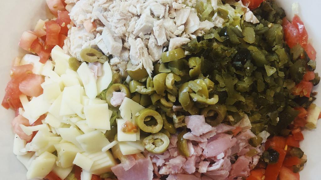 Maurice Salad · Leonard's choice. Gluten-free. Iceberg lettuce, Dearborn ham, house-made oven-roasted turkey, and swiss cheese tossed in little daddy's famous Maurice dressing topped with green olives, sweet pickles, and tomatoes.