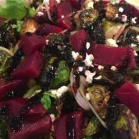 Roasted Beet & Brussel Sprout Salad · Leonard's choice. Gluten-free. Fresh romaine lettuce, feta cheese, toasted almonds, grilled ...