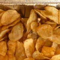 Daddy Chips · A bowl of little daddy's secret seasoned house-made potato chips.