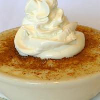 House-Made Rice Pudding · Gluten free.  Served warm or cold, topped with cinnamon sugar & whipped cream.