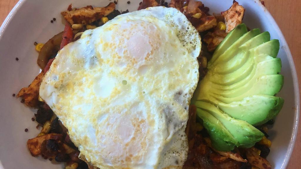 Chicken Avocado Bowl · Gluten free.  Sautéed amish chicken breast, sweet onions, mixed peppers, corn off the cob and black beans all simmered in a fire roasted salsa served over protein. Packed red quinoa topped with avocado and two eggs cooked to order.