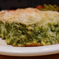 Little Daddy'S Original Spinach Pie · Fresh spinach, feta cheese, sweet onions & special seasonings, wrapped in filo dough then ba...