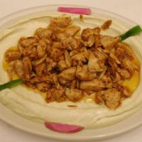 Hommous With Chicken · Gluten free. A bed of smooth hommous filled with chicken and almonds with choice of 2 sides.