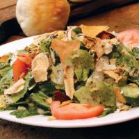 Fattoush Salad · A La Marsa Specialty. Our garden salad enhanced with toasted pita chips and special seasonin...