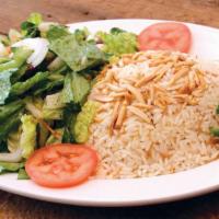 Rice Almond Salad · A fresh garden salad with rice pilaf and slivered almonds. Vegan.