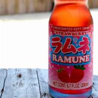 Ramune Strawberry Soda · Imported Asian strawberry soda 200 ml, peel the cap wrapper back and pop the marble into the...