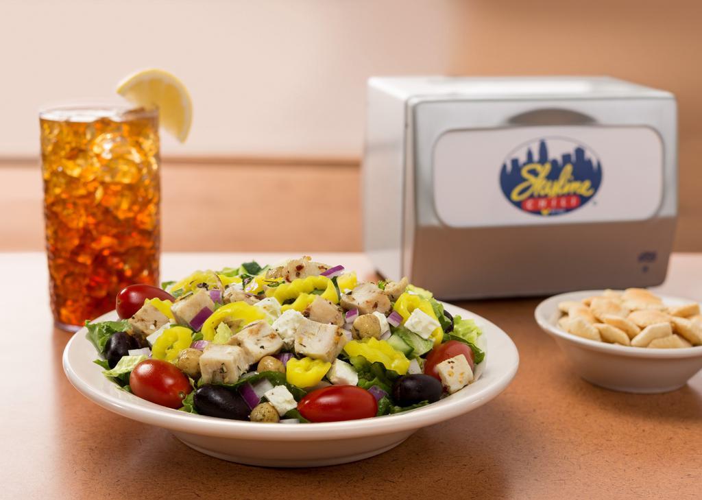 Greek Salad With Chicken · Lettuce, diced chicken breast, cucumbers, red onions, tomatoes, chickpeas, kalamata olives. Pepperoncini and feta cheese. Add skyline's original recipe greek dressing.