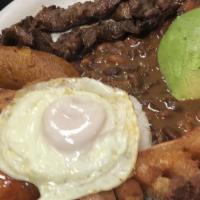 Bandeja Paisa Plate · Grilled skirt steak, chorizo, fried eggs, rice, beans, arepa, sweet plantain and avocado.
